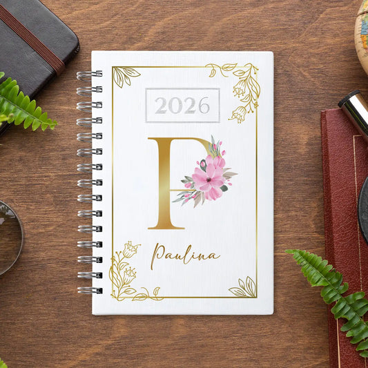 Agenda diária 2026 de argolas personalizada com nome. Capa PU acolchoado, formato A5.