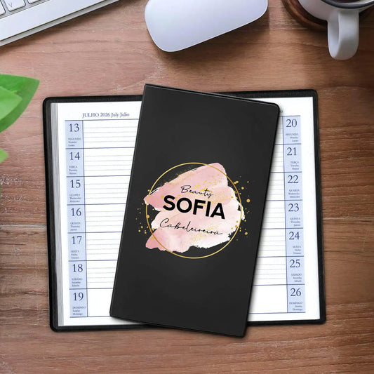 Agenda de bolso 2026 personalizada com nome e profissão. Capa em PVC, formato A6.