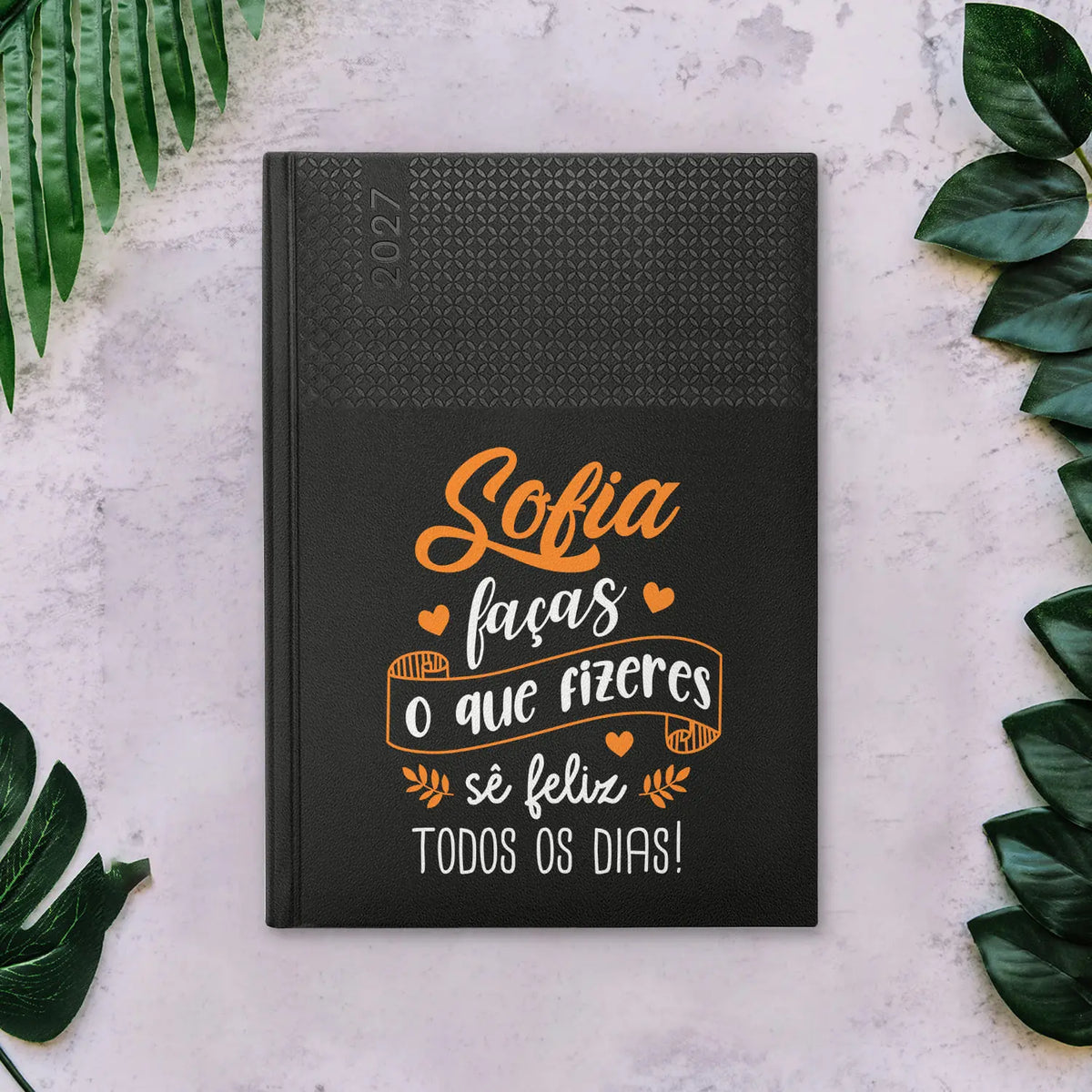 Agenda semanal 2027 personalizada com nome. Capa em PU, formato A5+.