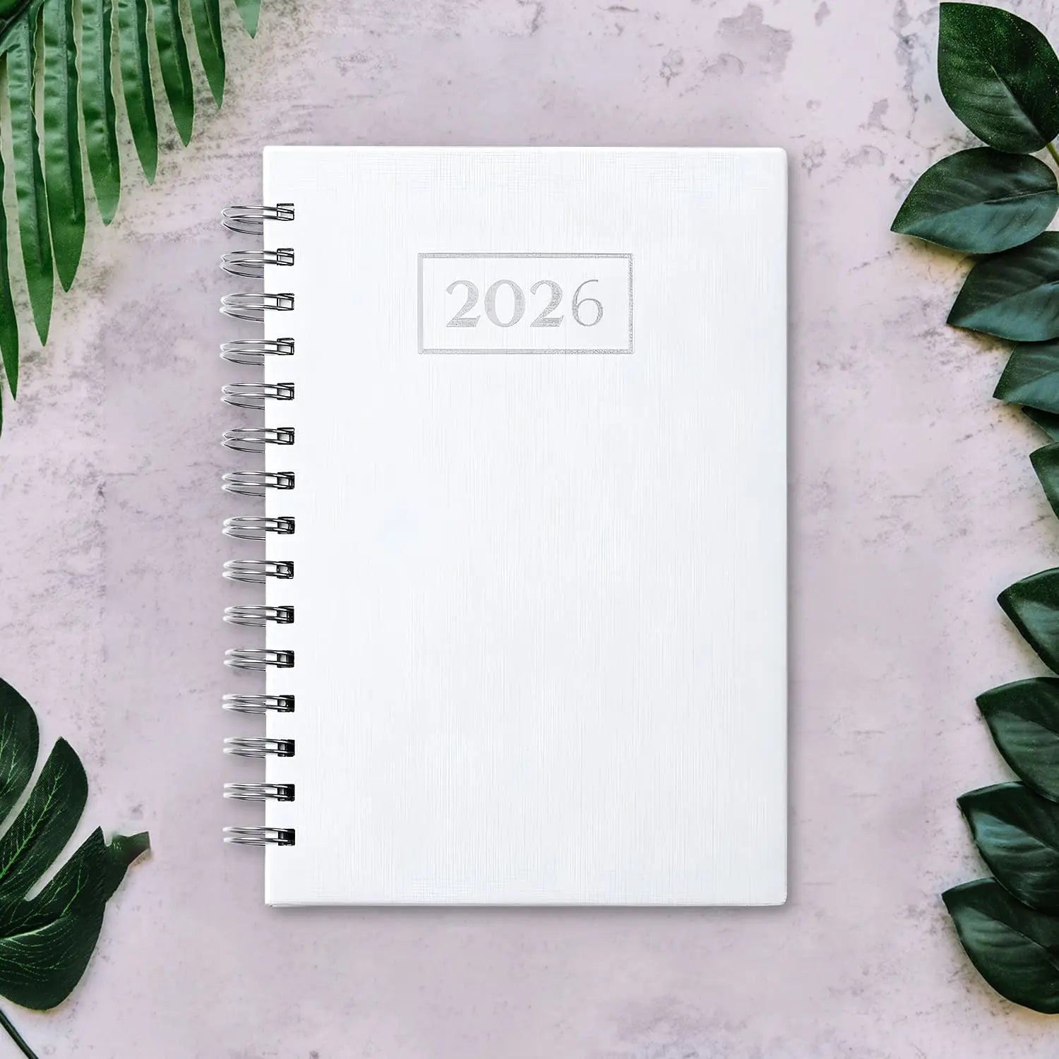 Agenda diária 2026 de argolas. Capa PU acolchoado, formato A5.